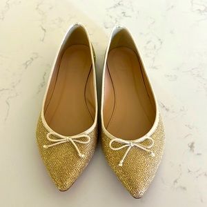J crew gold shimmer flats. Very comfortable and stylish.